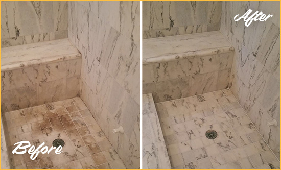 Before and After Picture of a Dirty Casmalia Marble Shower Cleaned to Eliminate Dark Stains